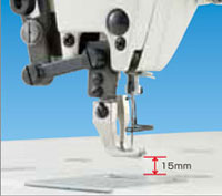 Dixie Tailoring Supply Close-up of the JAPANFUJI DU 1181 BRAND NEW WALKING FOOT SEWING MACHINE needle with its presser foot raised 15mm above the table, indicated by a red vertical arrow. Tailoring Supplies