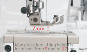 Dixie Tailoring Supply Close-up of the Jack K4 UT Automatic Coverstitch Sewing Machine presser foot, now with increased lifting height from 5 mm to 6.2 mm and a red arrow highlighting a 7 mm gap. Tailoring Supplies