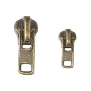 Dixie Tailoring Supply Two antique brass slider pulls of varying sizes sit against a white backdrop, showcasing the quality expected from premium tailoring products like the #5 Antique Brass Slider 6 PCS. Tailoring Supplies