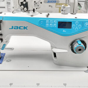 Dixie Tailoring Supply The JACK A4 Fully Automatic Industrial Sewing Machine, with blue and grey accents on a table, includes controls and a thread spool holder—perfect for tailoring stores seeking quality machines. Tailoring Supplies