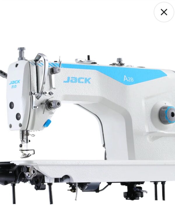 Dixie Tailoring Supply The Jack A2B Auto Thread Cutter Industrial Sewing Machine in white and blue is displayed from a side angle, highlighting its needle, presser foot, and machine controls. Tailoring Supplies