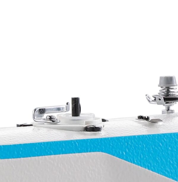 Dixie Tailoring Supply Close-up view of the Jack A2 Auto Thread Cutter Industrial Sewing Machine, showing its white and blue body, black lever, metal latch, and silver button or knob. Tailoring Supplies
