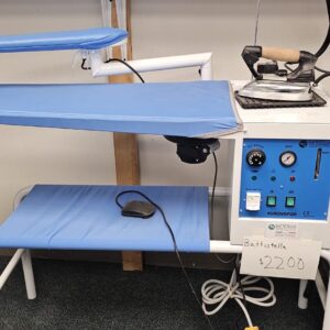 Dixie Tailoring Supply A Battistella Steam Iron 4 litre Made in Italy with control panel and ironing boards is for sale, displayed with a handwritten sign: "Battistella $220. Tailoring Supplies