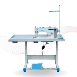 Dixie Tailoring Supply Industrial sewing machine with a flat worktable, control panel, and foot pedal, set on a metal frame with a thread stand attached. Tailoring Supplies